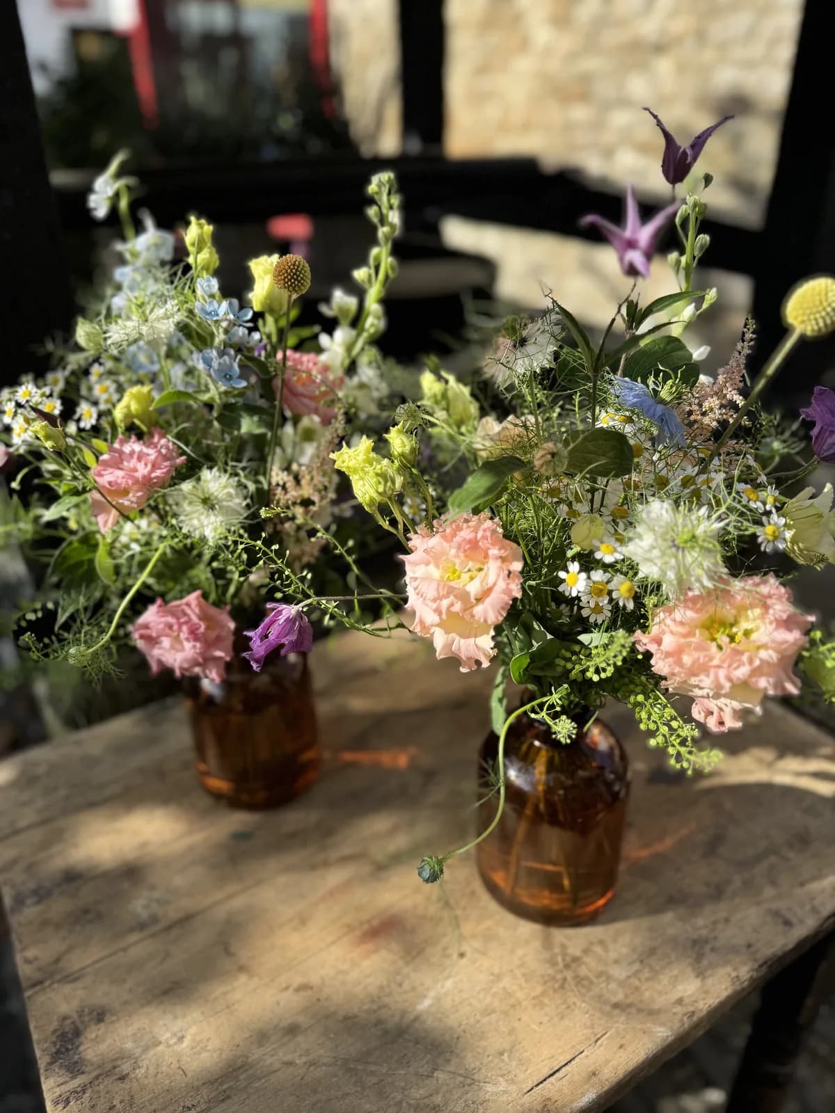 Bud vases arranged during a course