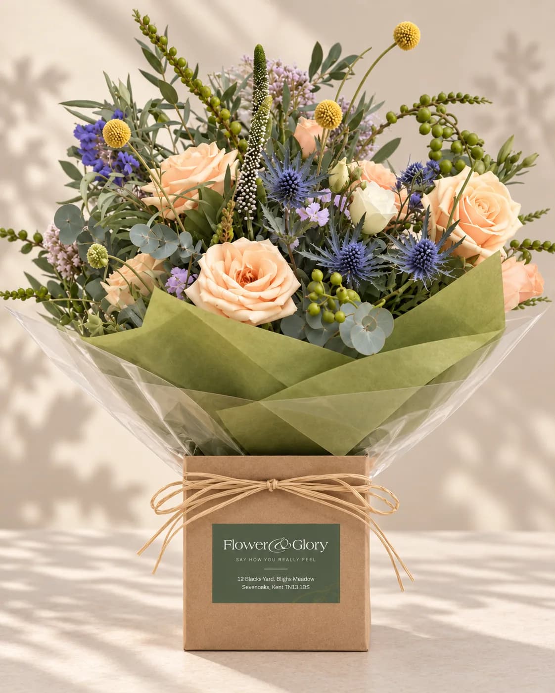 A wrapped Flower & Glory bouquet ready to go out